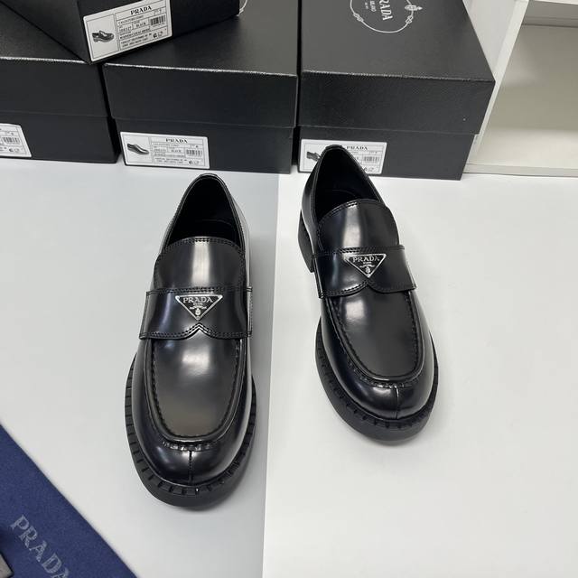 Prad* Men's slip-on loafer. Made in Italy with split-edge peacoat leather. A fre