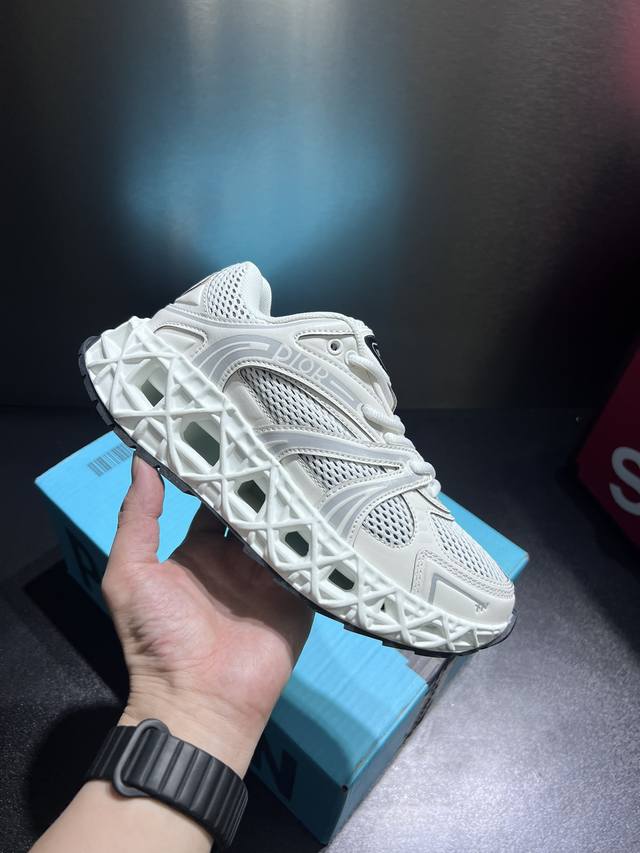actual price. The Dior X Kaws B35 capsule collection features a hollow mesh desi