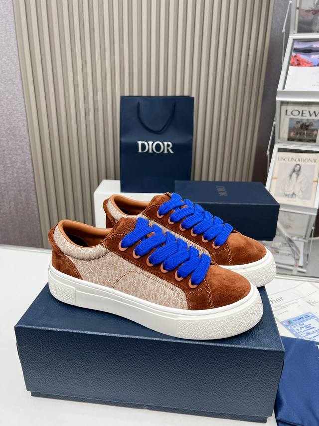 , featuring a brown and cream jacquard fabric with a brown high-mercerized suede