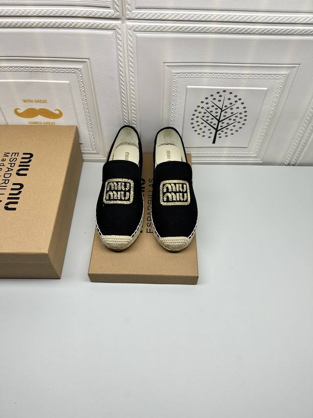 New Arrival. Miu Miu, this fisherman's shoe is crafted from cotton canvas with a