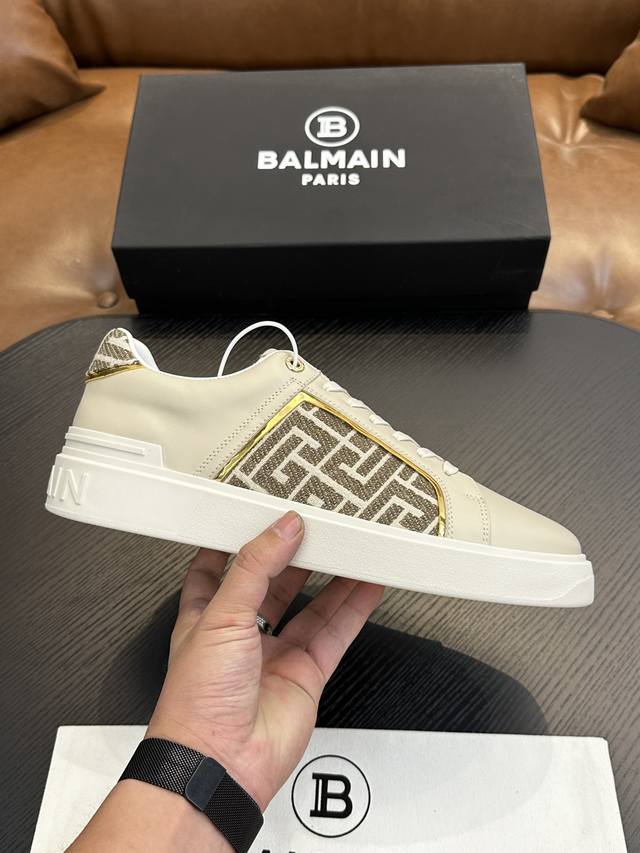 Balmain B-Skate sneakers. These multi-material, contrasting colorway sneakers fe