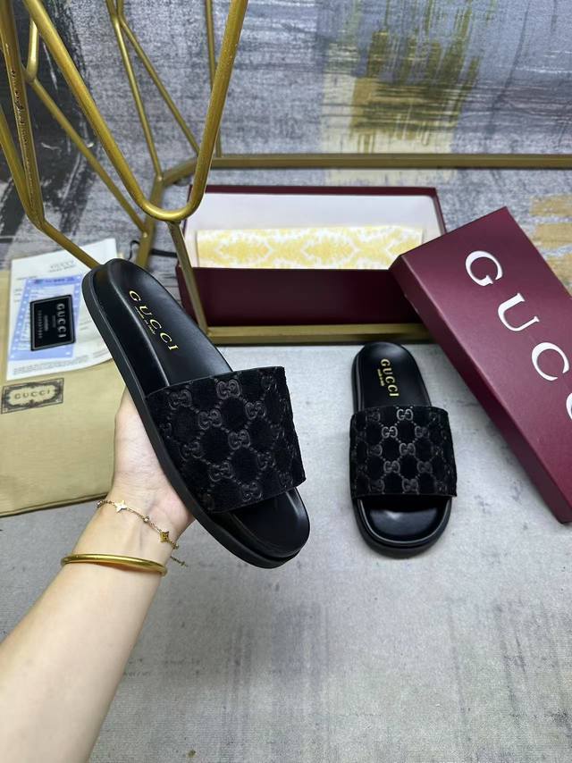 Gucci's latest hit slippers, featuring a soft suede upper with a Gg pattern for