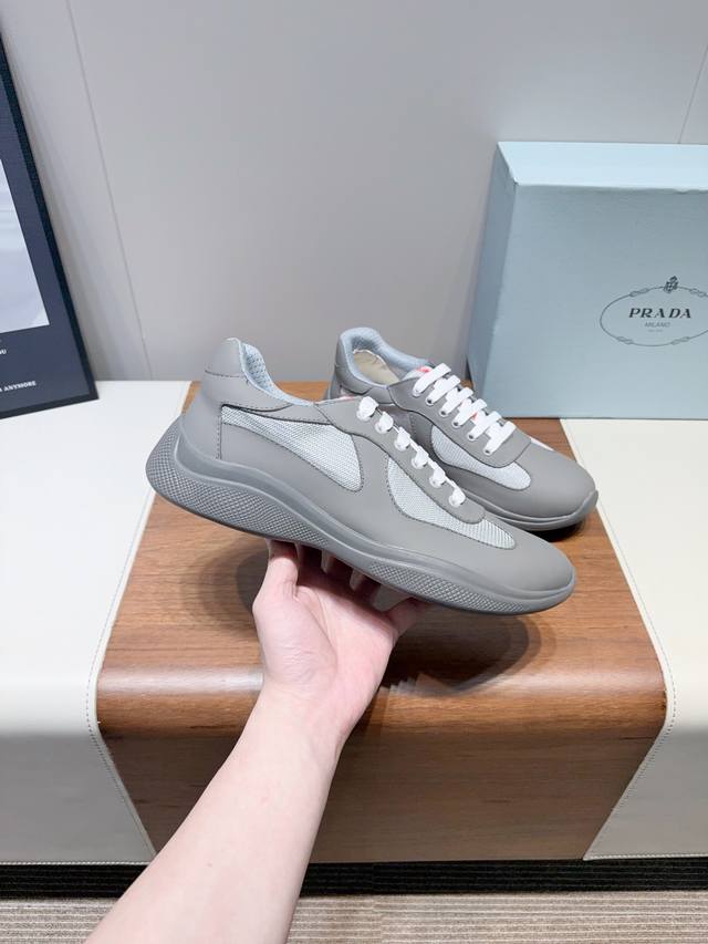 Prad 25Ss Spring/Summer couple's casual shoes feature an imported solid patent l