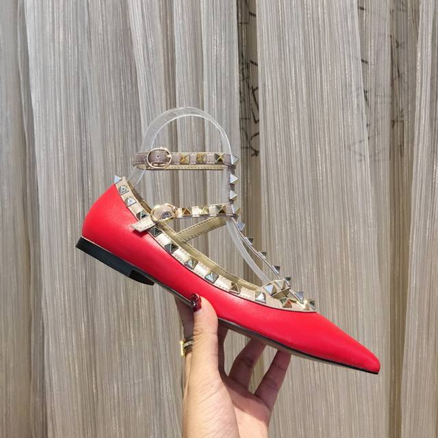 Matte red sheepskin, available year-round, in five collections. Valentino is a g