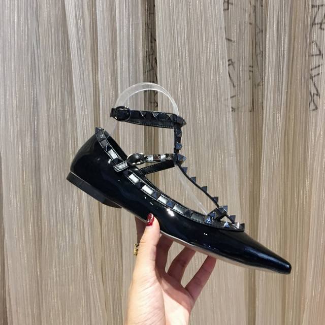 Five collections in all-black patent leather available year-round. Valentino is