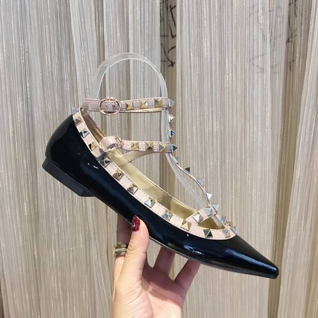 Available year-round in five black patent leather collections. Valentino is a gl