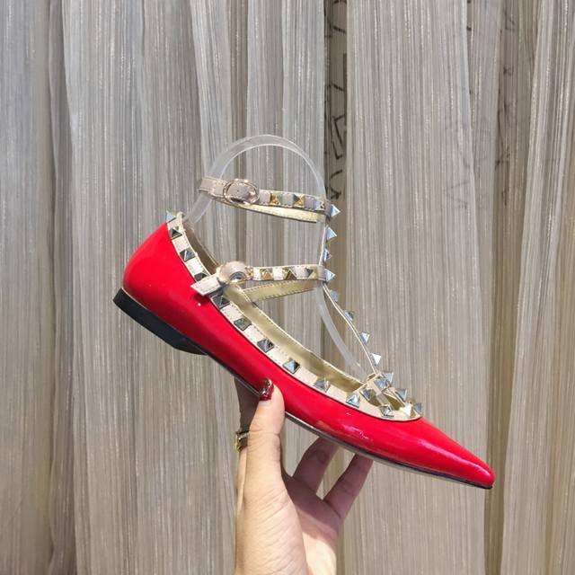 Five red patent leather collections available year-round. Valentino is a global