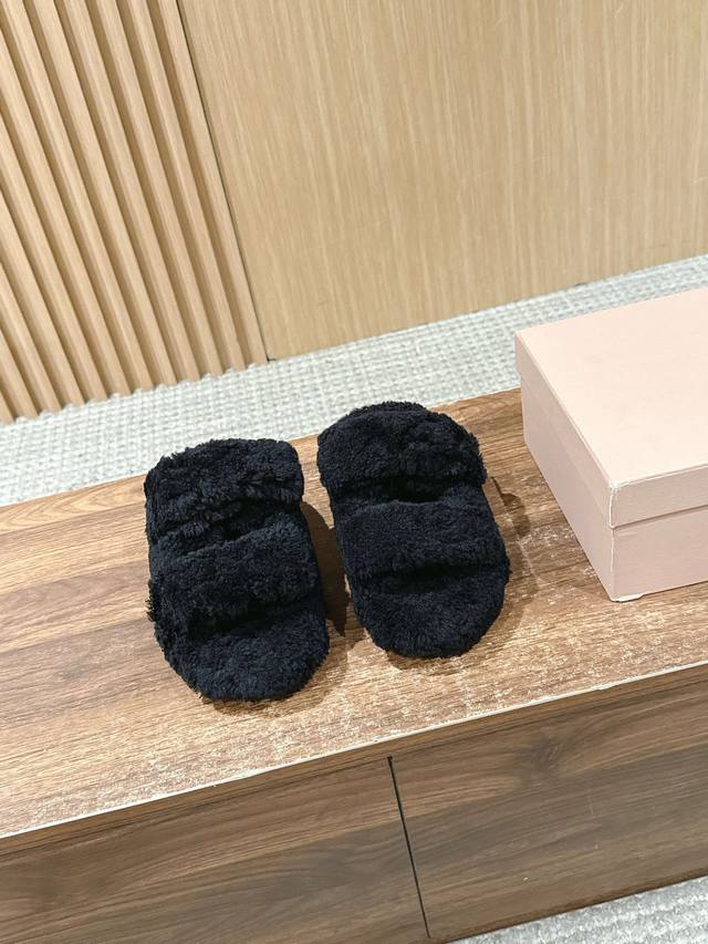 Miu Miu's new buckle-style wool slippers are perfect for fall and winter. They'r