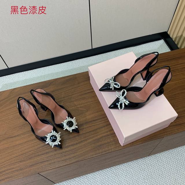 Amina Muaddi diamond-buckled slingback shoes. The silk upper is delicate and sof