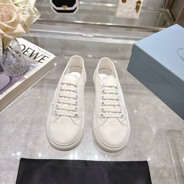Factory Price: P Prad* Prada 25Ss Round Toe Canvas Shoes. Featuring the latest i