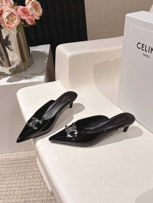 Celine's classic Arc de Triomphe pointed kitten heel slippers are instantly appe