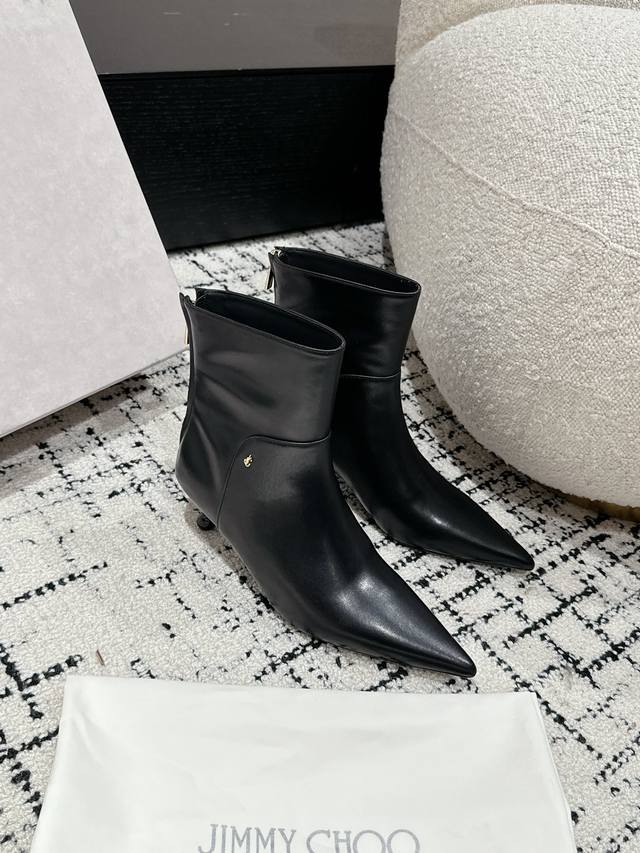 Jimmy Choo's classic teardrop heel boots are incredibly stylish and complement a