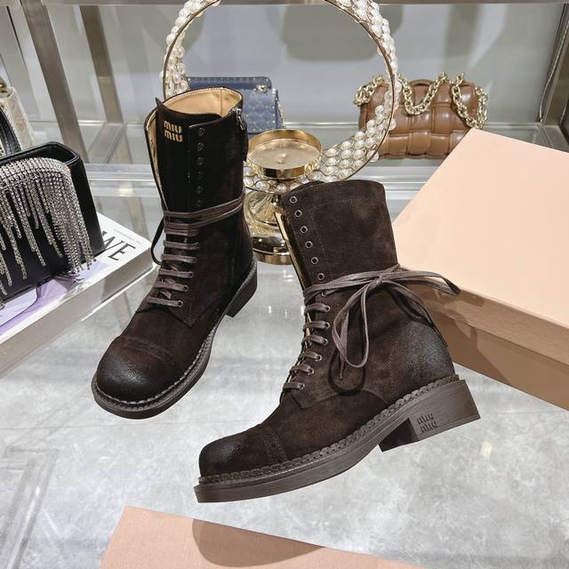 These new fall/winter Martin boots are incredibly stylish, showcasing Miu Miu's