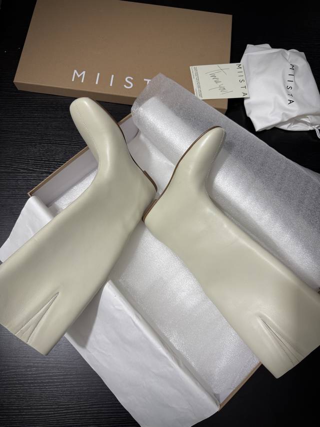Miist* New boots feature clean lines, a cool silhouette, and a simple, sophistic