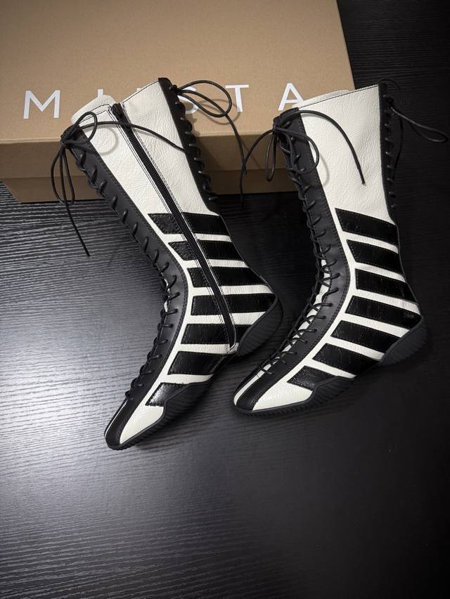 Miist* boxing boots. Who knows? Miista boots play up the checkerboard pattern wi
