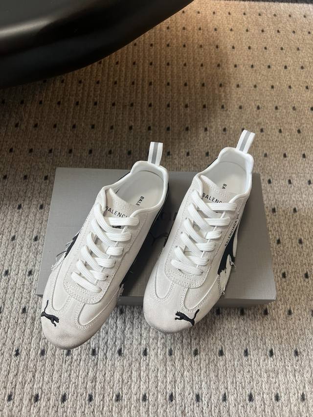 Puma Ultrasoft Speedcats couple's sneakers feature a soft, unstructured upper. T