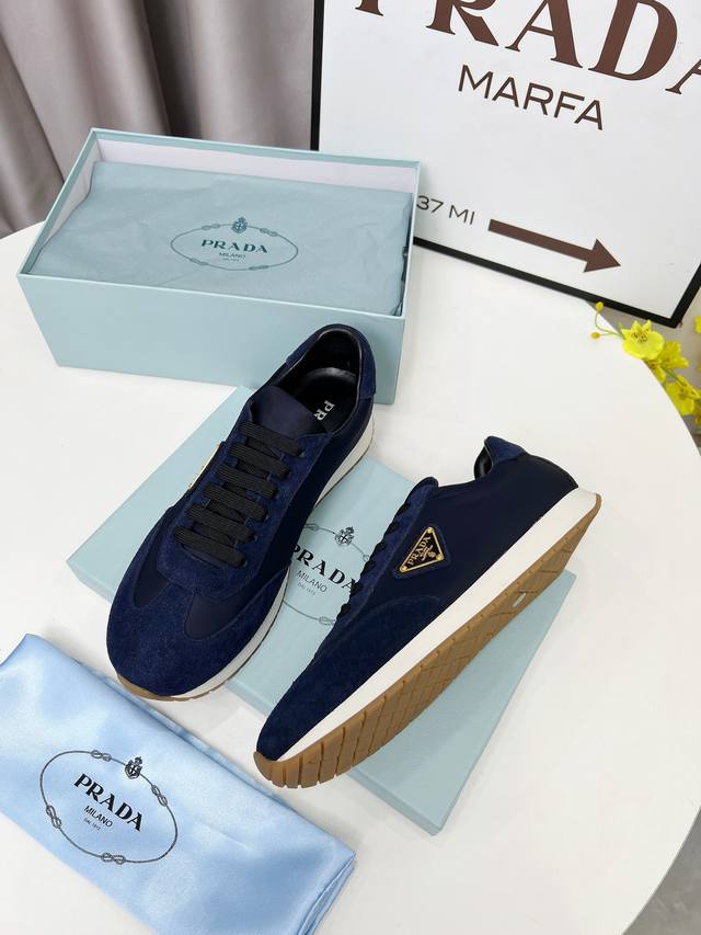 New Prada high-top shoes for men and women are now available at our stores. Feat