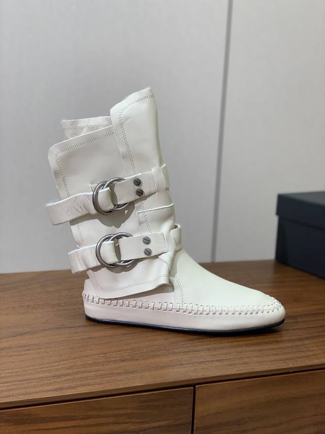 Ann Demeulemeester knight boots. Challenging tradition and infusing modern eleme