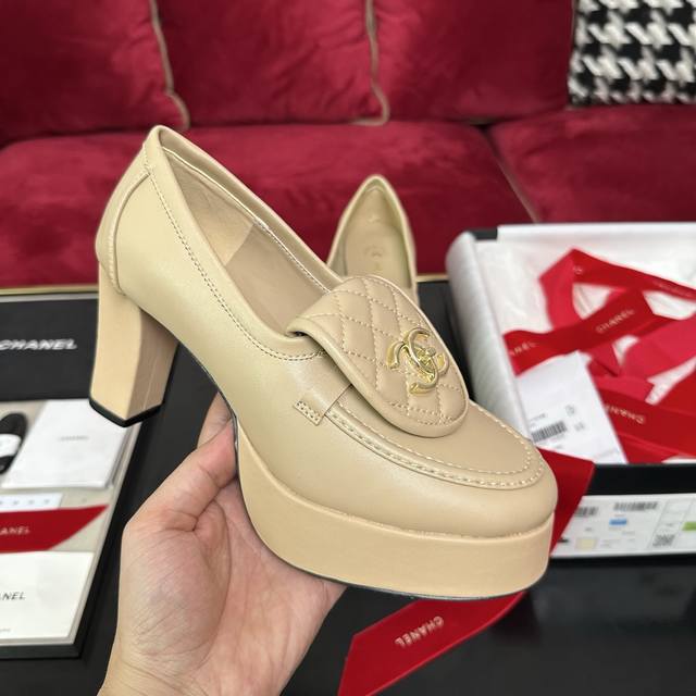 apricot color is here. Chanel's latest super high heel shoes with a classic scho