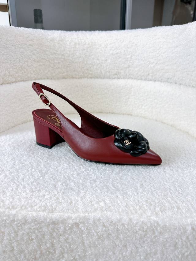Chanel's new Camellia pointed-toe slingback sandals are instantly appealing. Sup