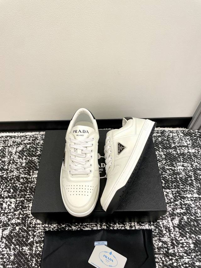 Men's +10! These Prada Downtown white sneakers are my absolute dream. These snea