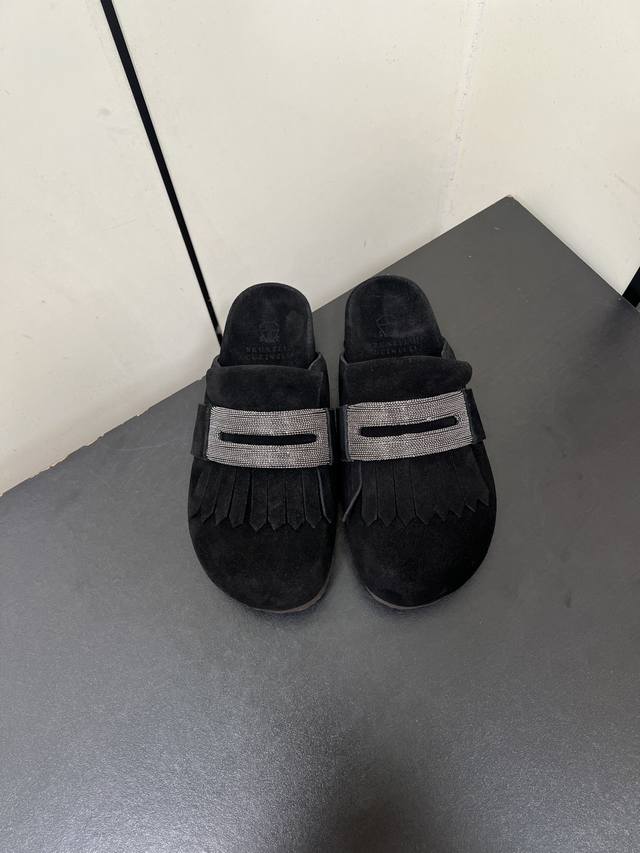 Brunello Cucinelli's new BC closed-toe tassel Birkenstocks are a uniquely stylis