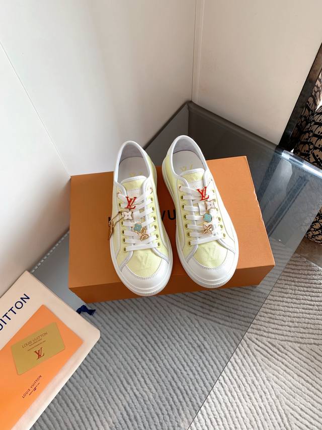 Louis Vuiton couple's casual sneakers. These LV Trainer sneakers are a classic c