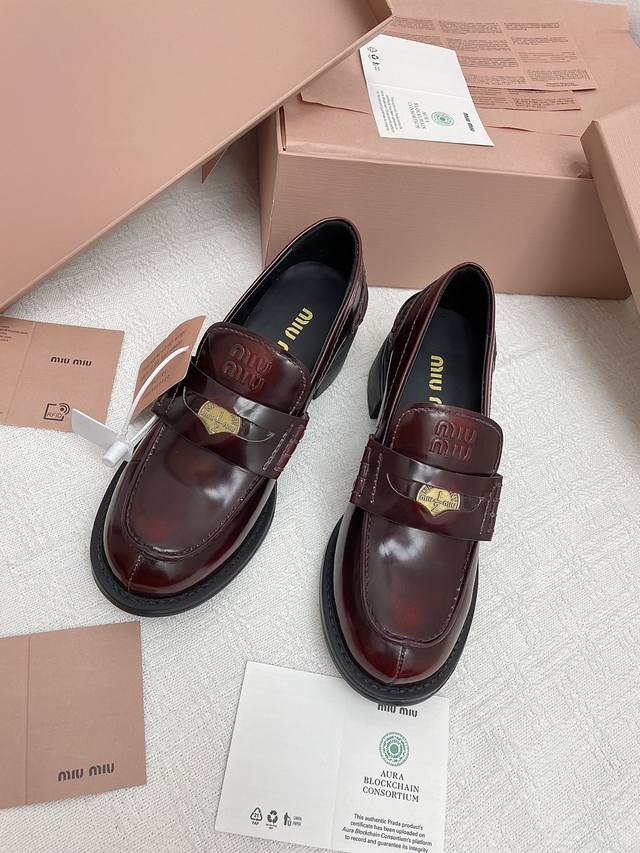 Dongguan Purchasing Agent Miu Miu's new block-heeled coin loafers are a hit thi