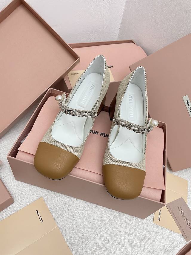 A must-have Miu*Miu classic Mary Jane sandals with square-toe, chunky heels and