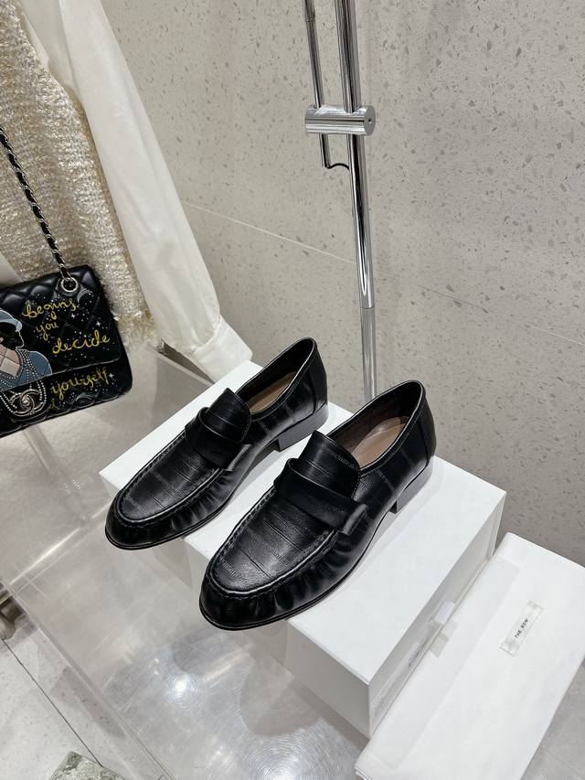 Therow's classic commuter loafers feature a hidden elastic design inside the sho