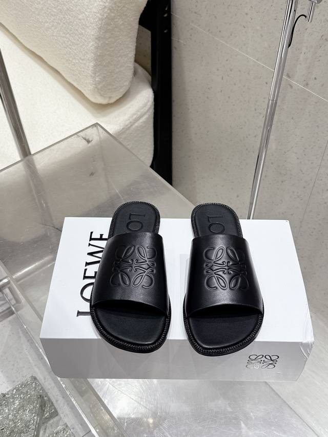 Top-of-the-line Loewe Etal Anagram open-toe flat slippers for Spring/Summer 25.