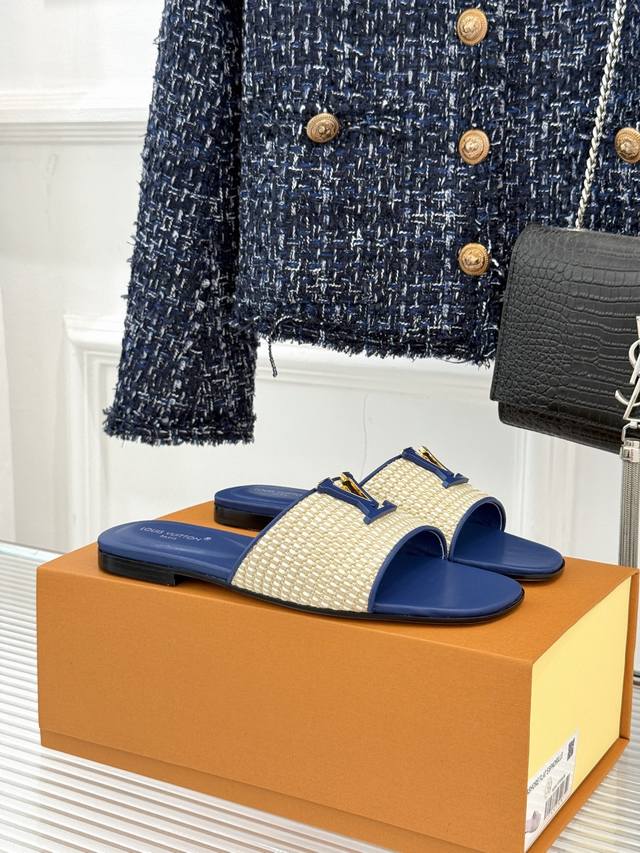 Factory Price: L*V Donkey Brand Classic Woven Flat Slippers. Their design is sim