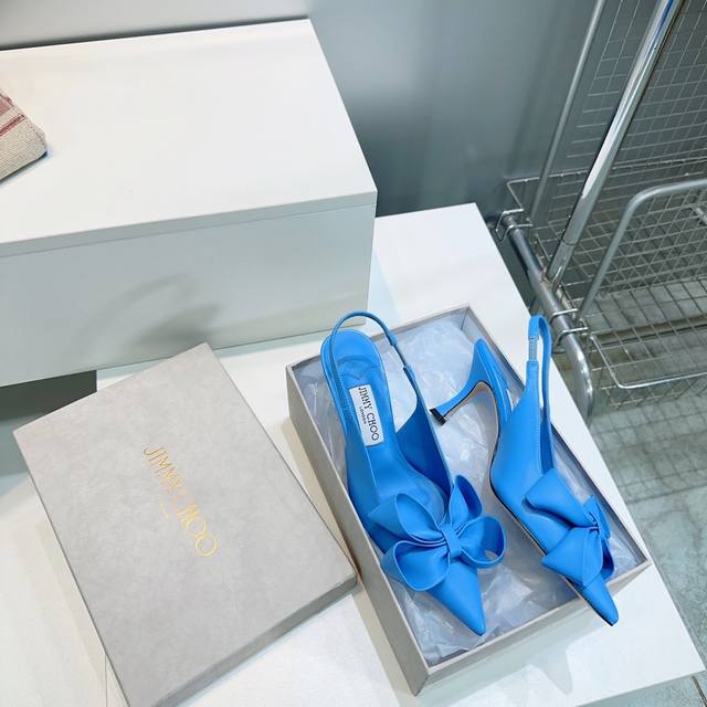Top-quality Jimmy Choo's new Staz pointed-toe floral bow mules and slippers from