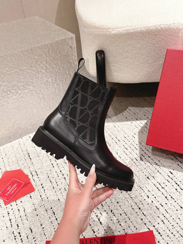 Valentino. Valentino's latest collection of V-branded boots. Luxurious and stunn