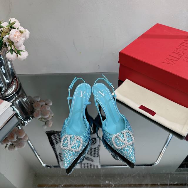 A top-tier, ultra-slim, gradient diamond sandal from Valentino. New summer model