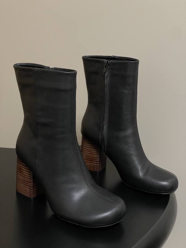 Lemaire's new early fall 2025 block-heeled, round-toed, simple, high-end ankle b