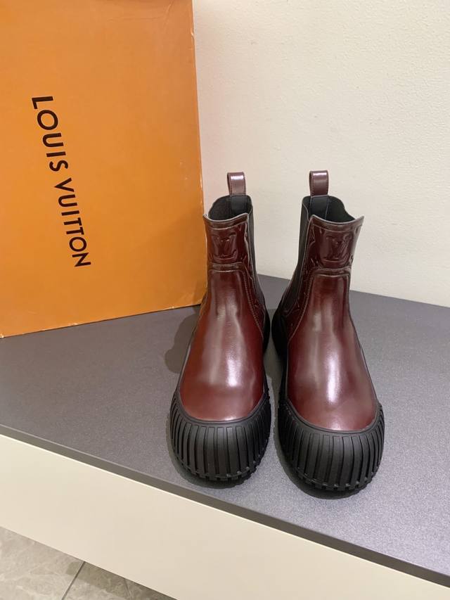 An updated version of the classic Louis Vuitton ankle boot! These platform, thic