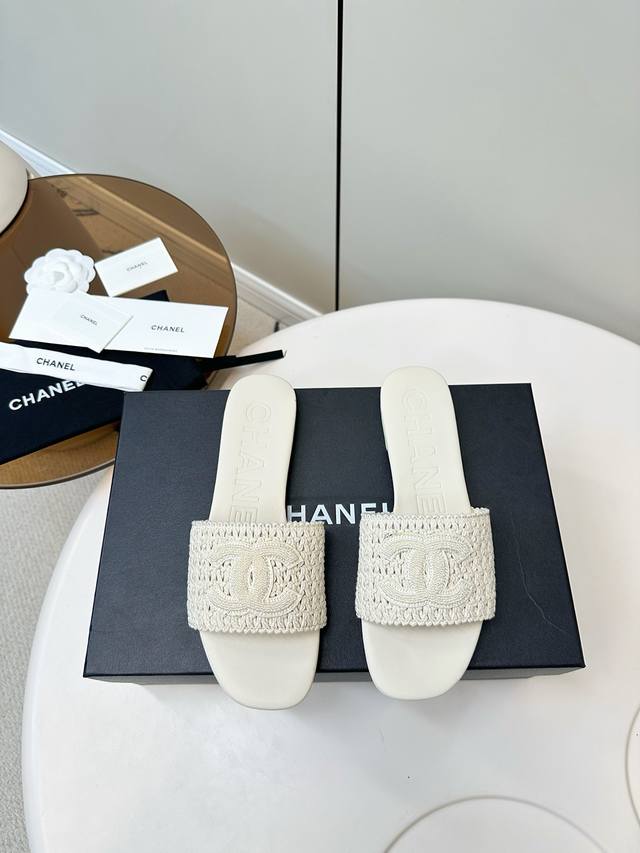 Chanel | Chanel woven flat slippers are a summer favorite among fashionistas. Th