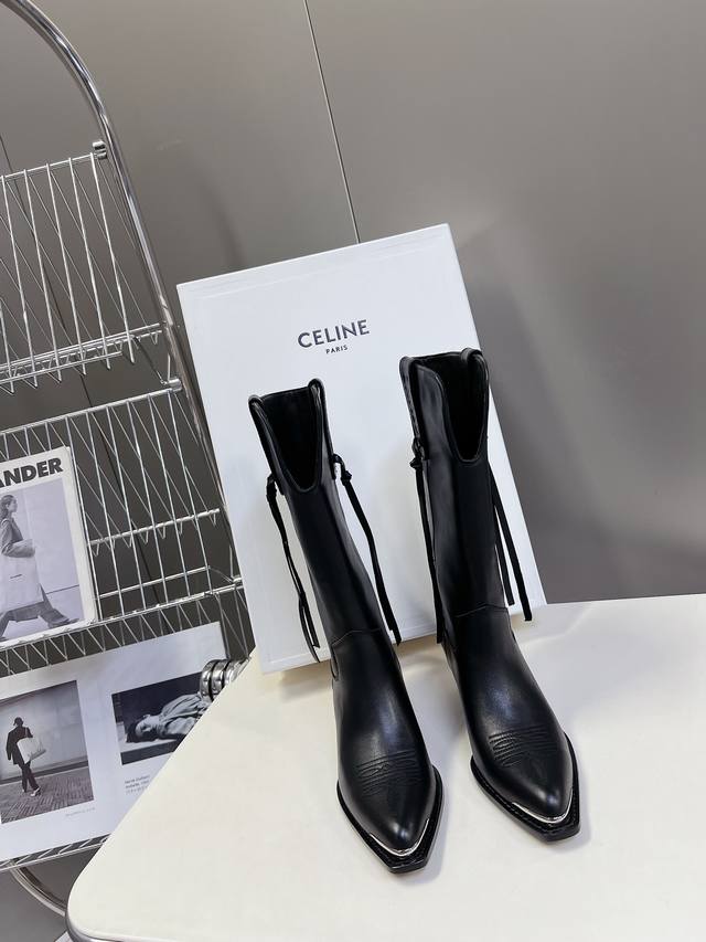 Celine's latest fashion boots, catwalk-ready and a must-have for early fall! A m