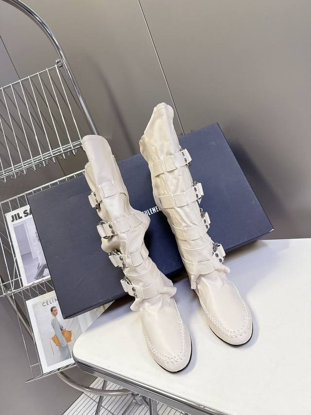 Ann Demeulemesster's latest autumn and winter show model, buttoned stacked boots