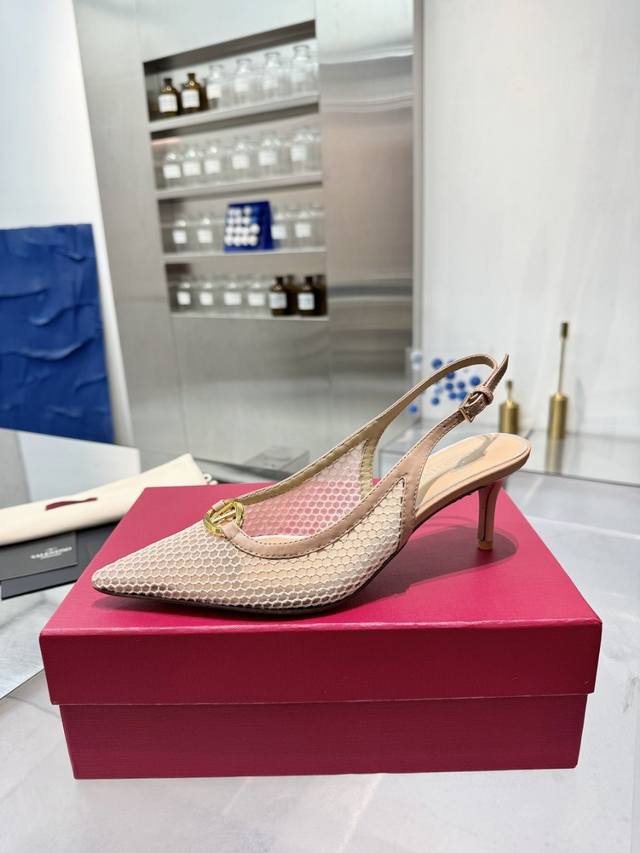 Valentino's hottest new slippers are so comfortable... The latest logo buckle an
