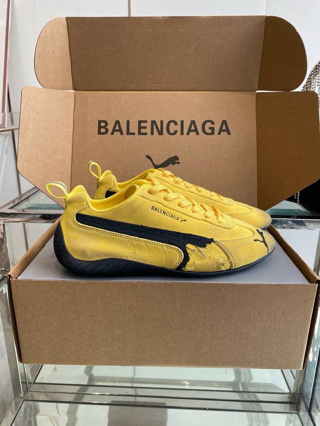 Balenciaga and Puma's latest collaborative couple's sneakers, featuring imported
