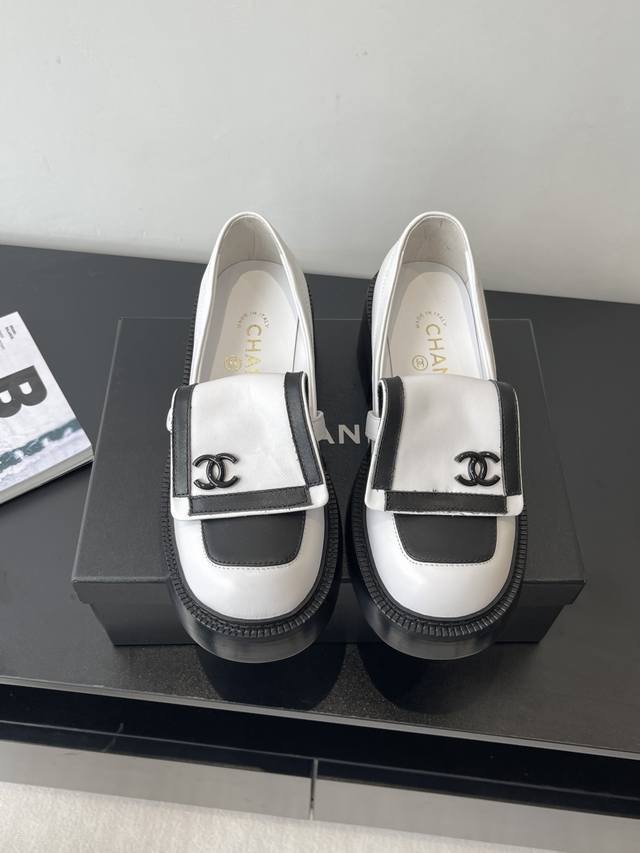 Chanel's panda colorblock loafers are adorable and vintage-inspired. The black a