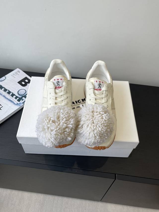 the latest spring/summer sneaker from Rei Kawakubo's CDG sub-brand. A highly pho