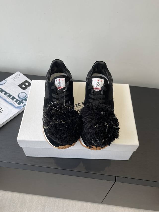 the latest spring/summer sneaker from Rei Kawakubo's CDG sub-brand. A highly pho