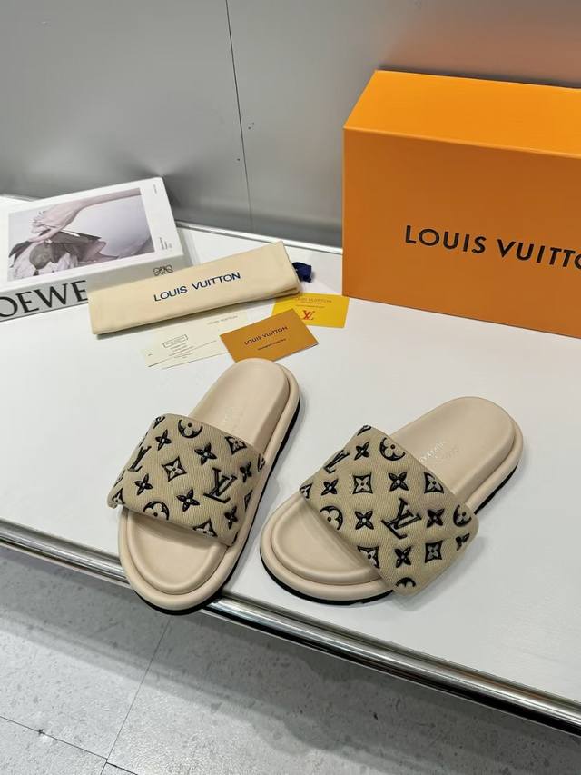 Donkey Brand L's popular embossed logo sandals. These Pool Pillow Comfort flat s