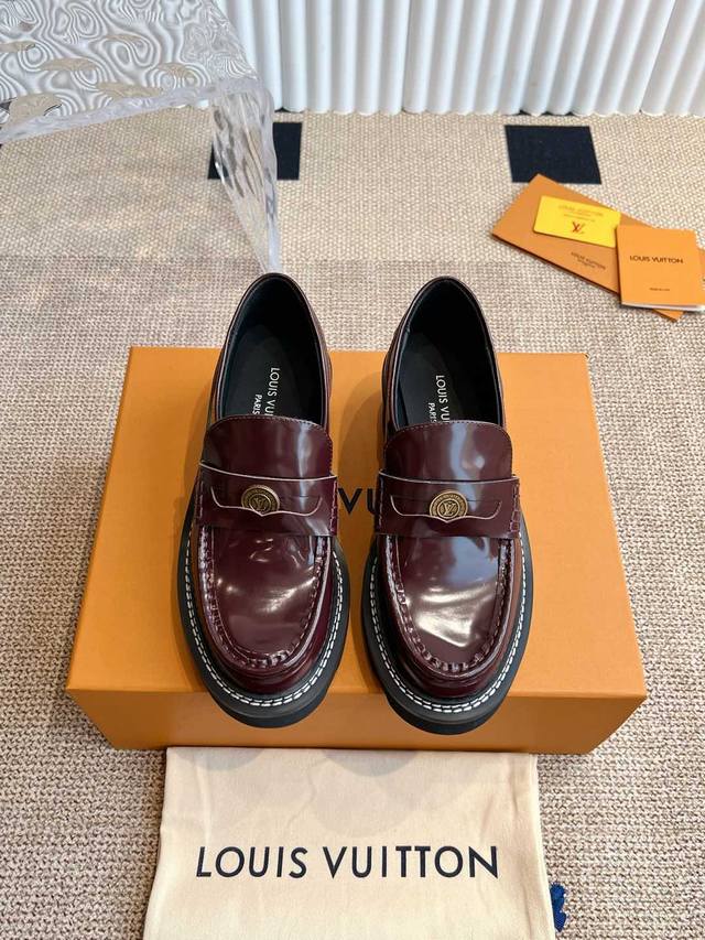 Louis Vuitton Gold Coin Loafers. These Distric loafers are crafted from two-tone