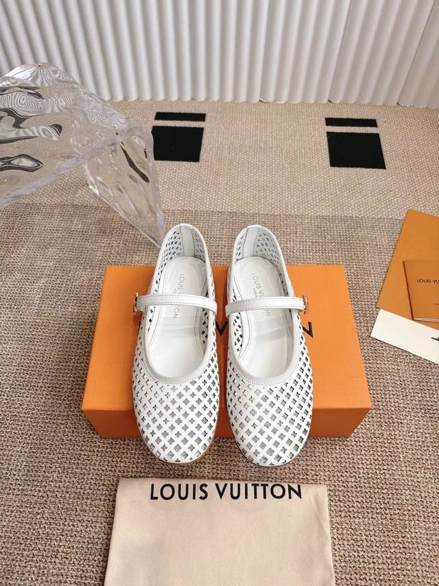 Louis Vuitton Ballet Flats. These Romy ballet flats feature patent cowhide leath