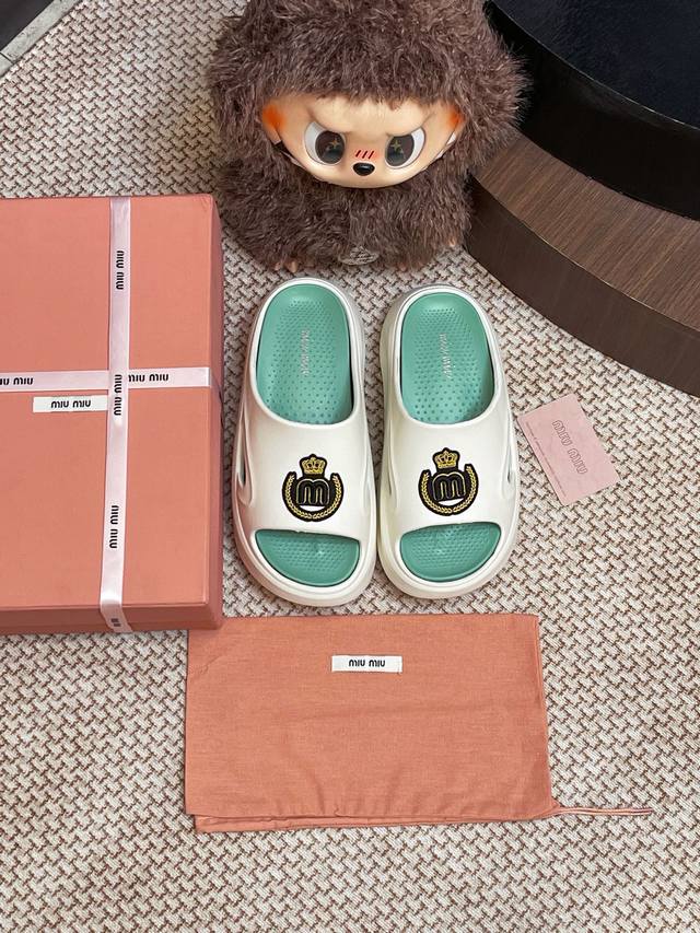 Miumiu foam slippers. The entire pair of shoes is sourced from Zp and developed