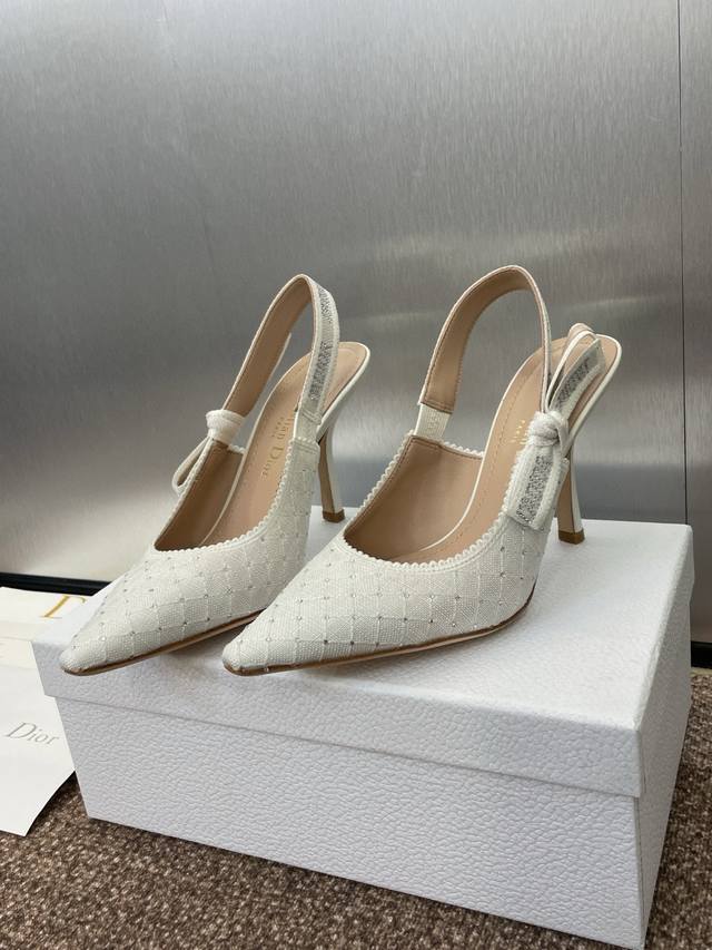 9.5cm J'adior Webbed Sandals, a top-tier, premium-priced pair from the Dior Spri